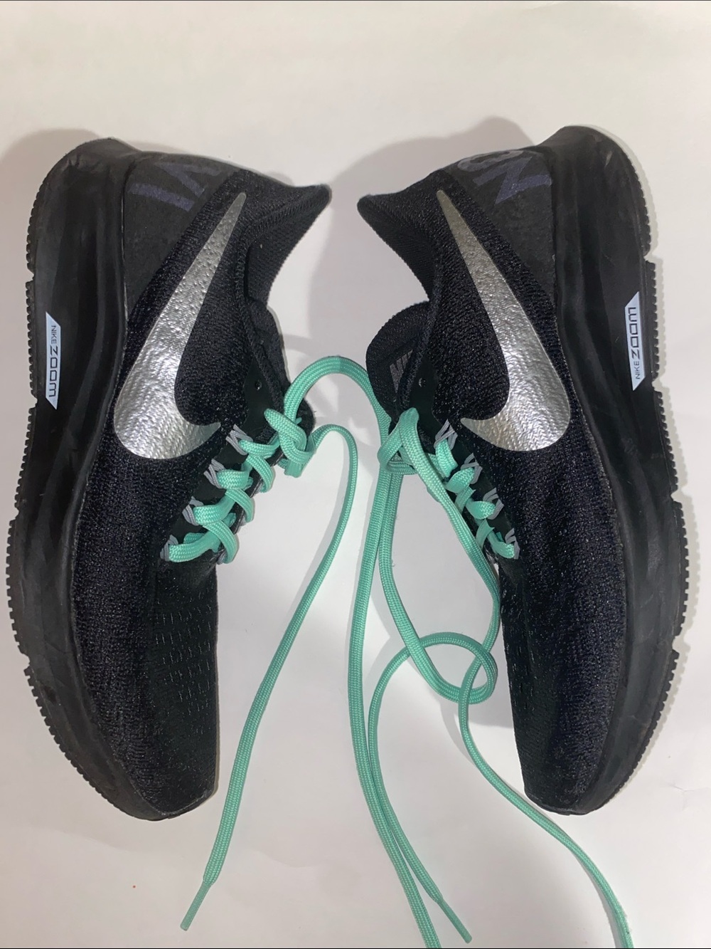 Nike Women's Black Running Shoes with Silver Swoosh and Mint Green Laces